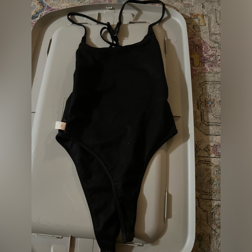 Women’s bodysuit with open back